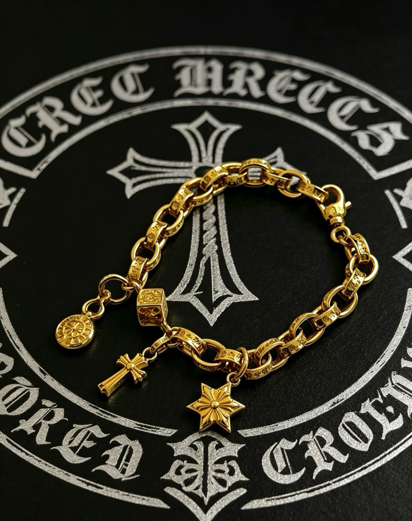 Chrome Hearts Gold Tone Charm Bracelet with Cross, Star, and Coin Charms